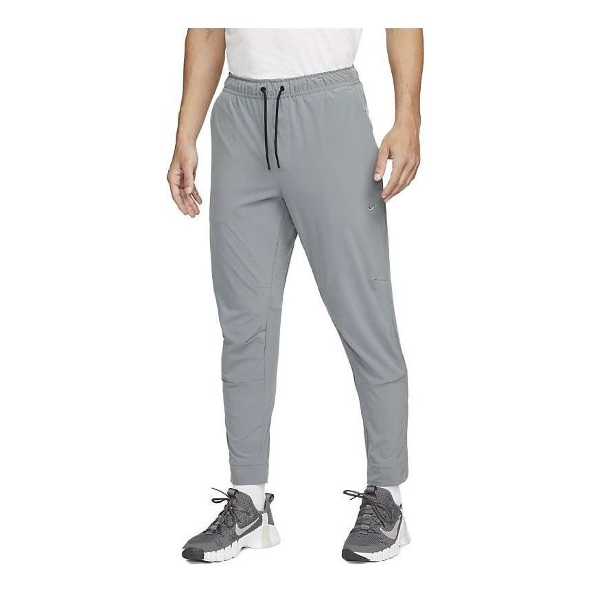 Trenirka Nike Zippered Cuff Versatile Training Pants Siva | FB7549-084, 0