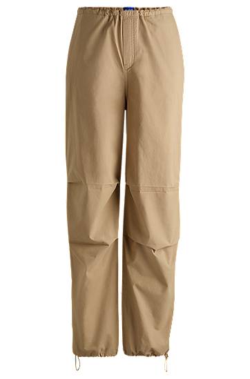 Cargo hlače BOSS Baggy Parachute Cotton Canvas Trousers Bež | 50527950