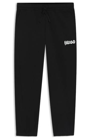 Trenerka BOSS Cotton-terry tracksuit bottoms with logo print Crna | 50549779