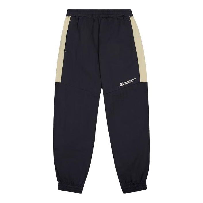 Trenirka New Balance Woven Track Pants Plava | NTE24031-BK