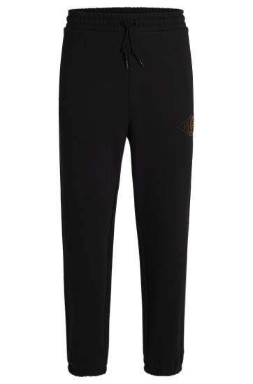 Trenirka BOSS Cotton-Terry Tracksuit Bottoms with Embroidered Logo Crna | 50534952