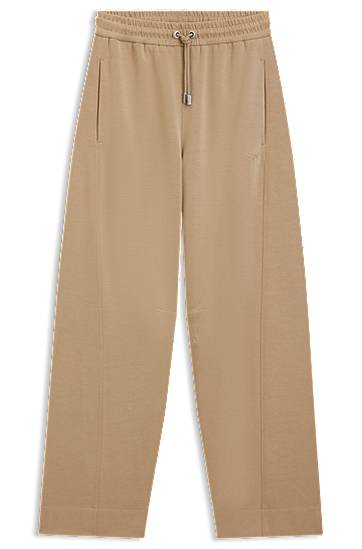 Trenirka BOSS Stretch Jersey Balloon Trousers with Embroidered Logo Bež | 50547800, 0