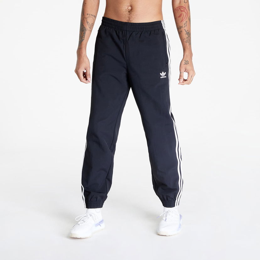 Hlače i traperice adidas Originals adidas Woven Fbird Track Crna | IT2501