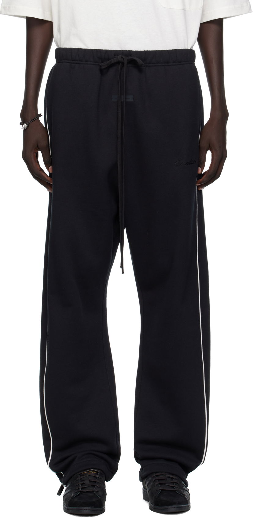 Trenirka Fear of God Fear of God ESSENTIALS Relaxed Fleece Piping Sweatpants Crna | 130SP258060F