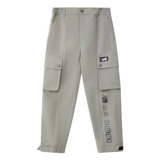 Cargo hlače New Balance Tyakasha Cargo Pants Zelena | NTA4N431-GR