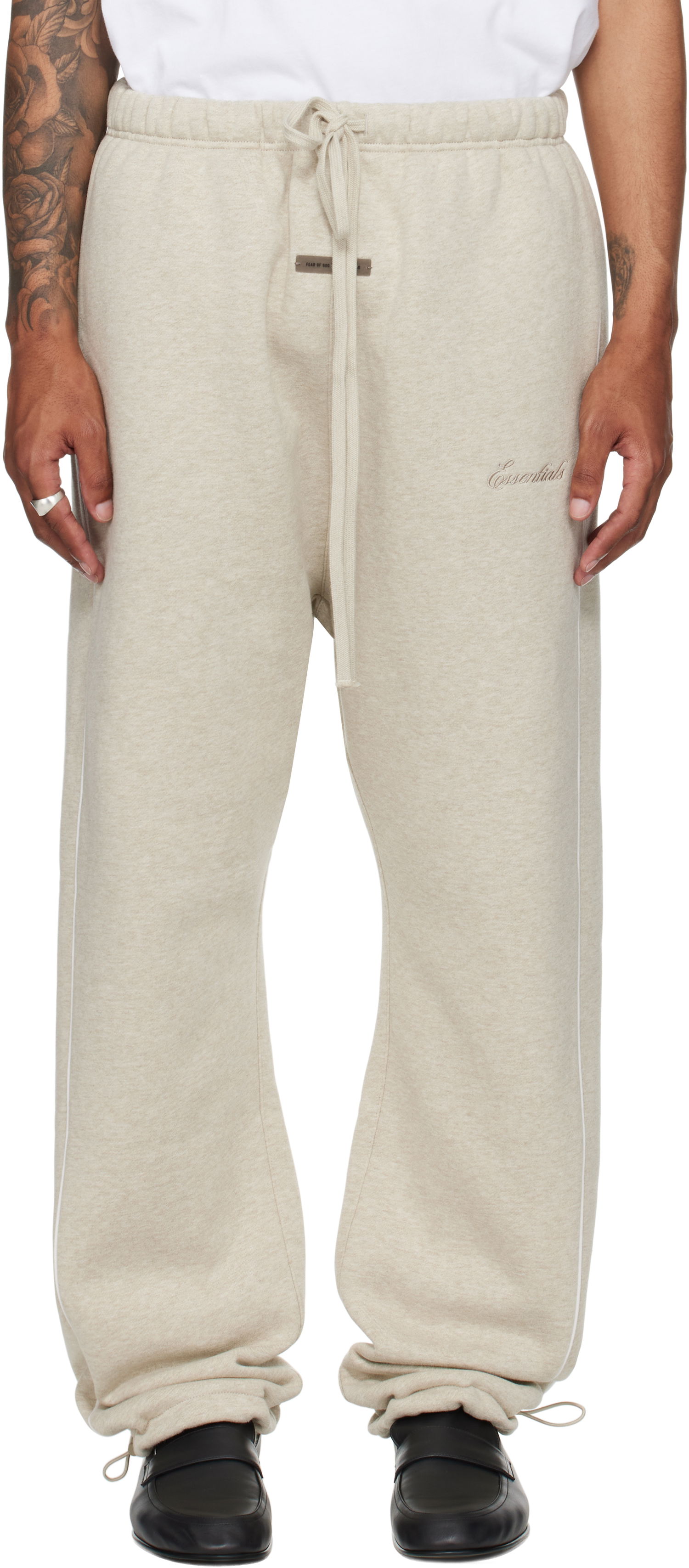 Trenirka Fear of God Fear of God ESSENTIALS Relaxed Fleece Piping Sweatpants Bež | 130SP258062F, 0