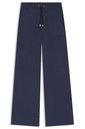 Trenirka BOSS Relaxed-Fit Tracksuit Bottoms with Embroidered Logo Tamnoplava | 50543512