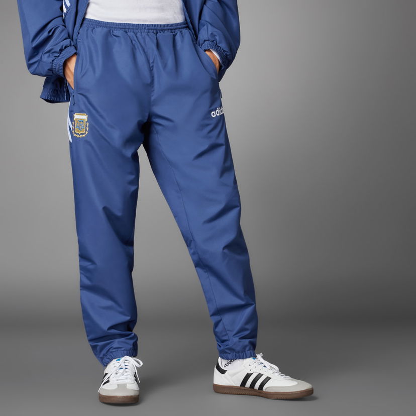 Hlače i traperice adidas Performance Argentina 1994 Woven Tamnoplava | IX1882