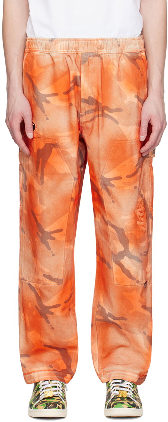 Cargo hlače AAPE by A Bathing Ape AAPE by A Bathing Ape Camo Cargo Pants Narančasta | AAPPTMA682XAMBGE