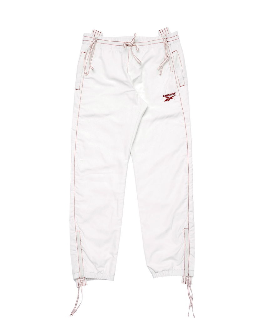 Hlače Reebok Kanghyuk x TRACK PANTS Bijela | RMCJ008C99FAB0010300